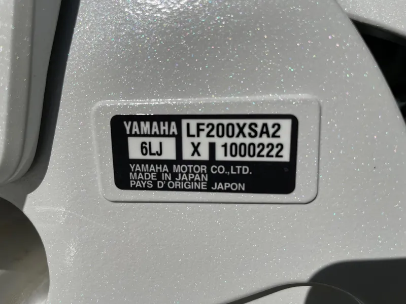 Slide: The Image of Yamaha F200XSA2 engine label on 2024 Cobia 262 Center Console boat. - 13