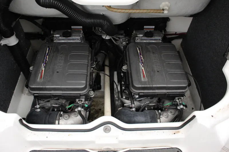 Slide: The Image of 2007 Yamaha Boats 230sx twin engines in engine compartment. - 16
