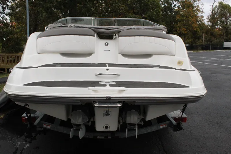 Slide: The Image of 2007 Yamaha Boats 230sx rear view on trailer in parking lot. - 3