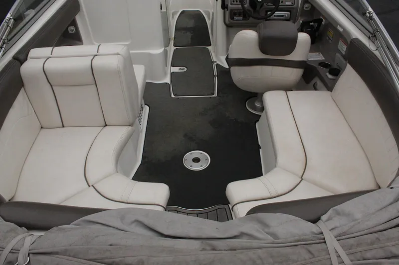 Slide: The Image of 2007 Yamaha Boats 230sx interior with white and gray seating. - 5