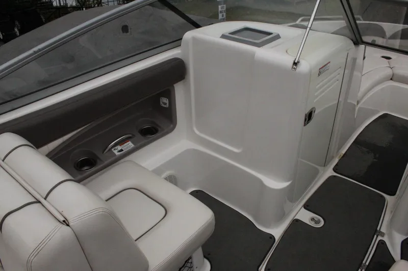 Slide: The Image of Interior of a 2007 Yamaha Boats 230sx, featuring seating and storage compartments. - 7