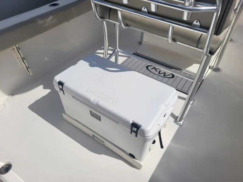 Slide: The Image of 2024 Key West 239 FS boat deck with cooler and seating. - 18