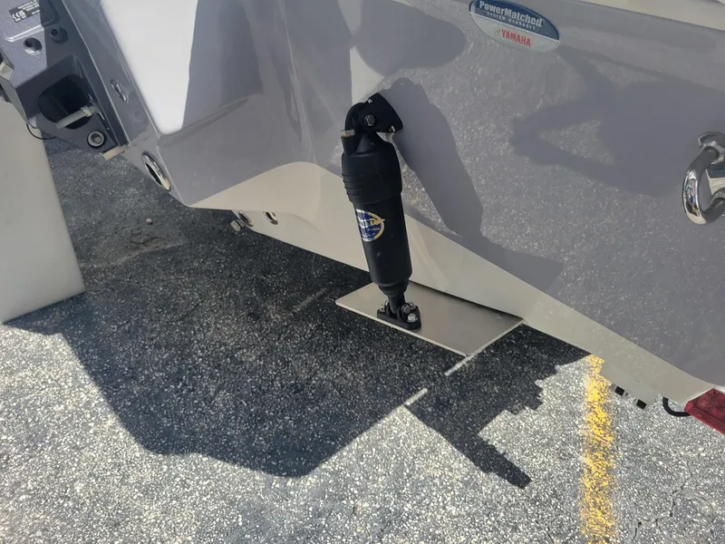 Slide: The Image of 2024 Key West 239 FS boat trim tab and hydraulic actuator. - 20
