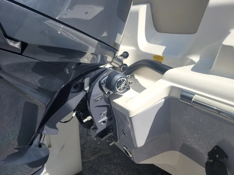 Slide: The Image of 2024 Key West 239 FS boat engine and stern close-up. - 21