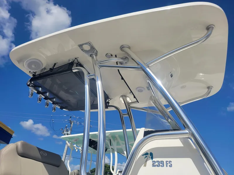 Slide: The Image of 2024 Key West 239 FS boat with T-top and rod holders. - 22
