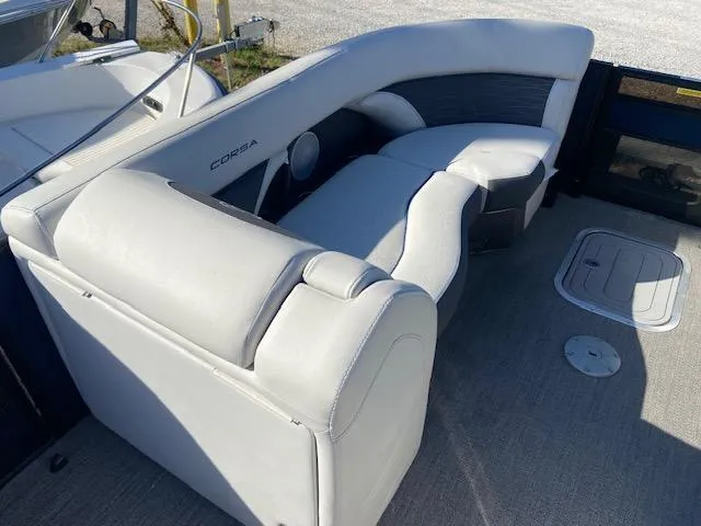 Slide: The Image of 2023 Barletta Corsa 23 UC boat cockpit with modern steering and comfortable seating. - 12