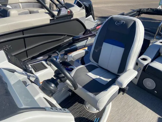Slide: The Image of 2023 Barletta Corsa 23 UC boat seating with elegant upholstery and integrated cup holders. - 15