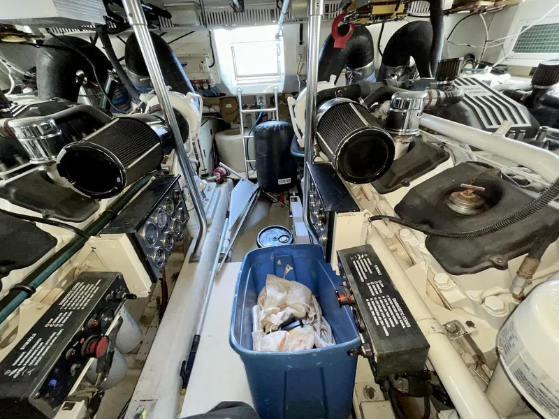 Slide: The Image of Engine room of a 2003 Ocean Yachts 62 Convertible with twin engines and equipment. - 40