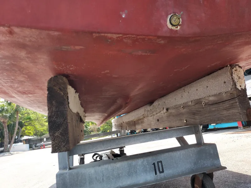 Slide: The Image of Bottom view of a 2000 Eastern 19 Center Console boat on a trailer. - 38