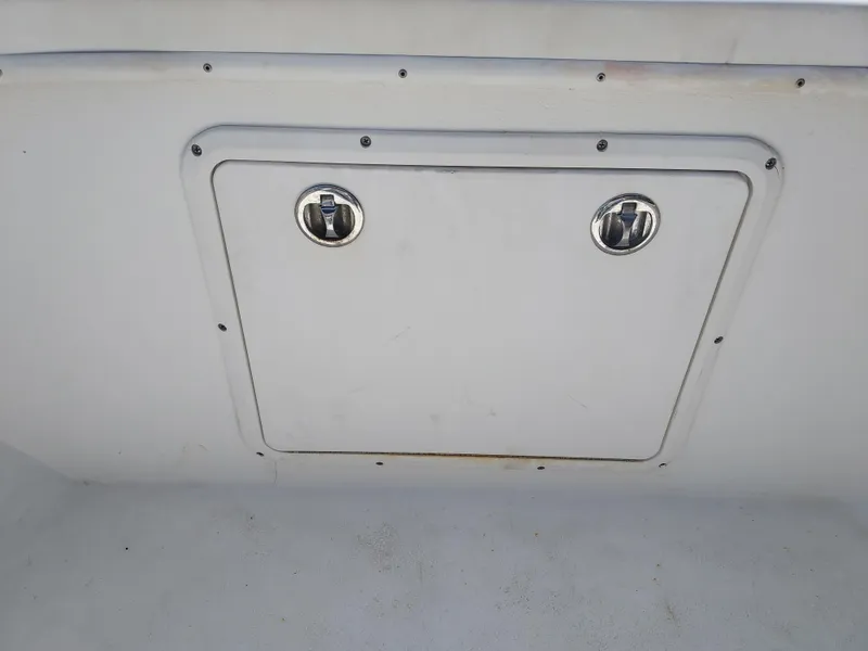 Slide: The Image of Hatch door on a 2000 Eastern 19 Center Console boat. - 44