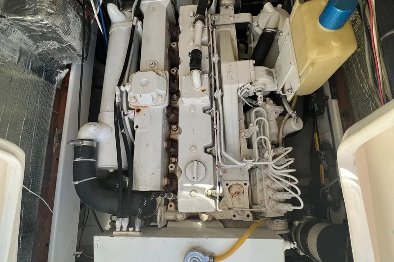Slide: The Image of 2004 SeaVee 32 Cuddy Inboard Diesel engine compartment with visible components. - 25