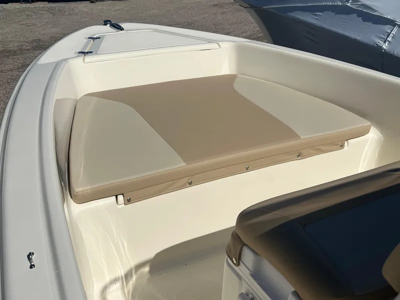 Slide: The Image of 2024 Scout 175 Sportfish boat with beige seating. - 14