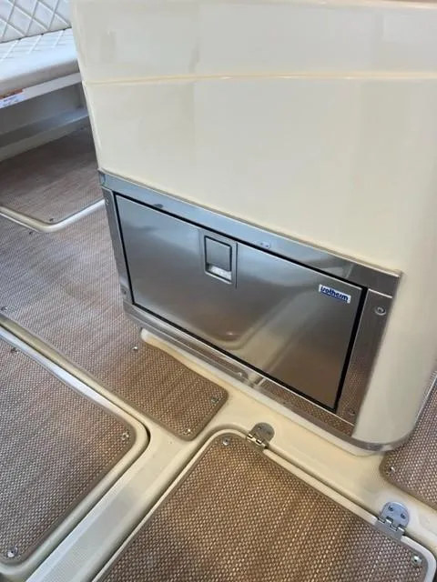 Slide: The Image of Chris-Craft Catalina 30 2020 interior with stainless steel refrigerator. - 21