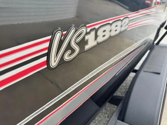 Slide: The Image of 2024 Ranger VS1882WT boat with red and white stripes. - 9