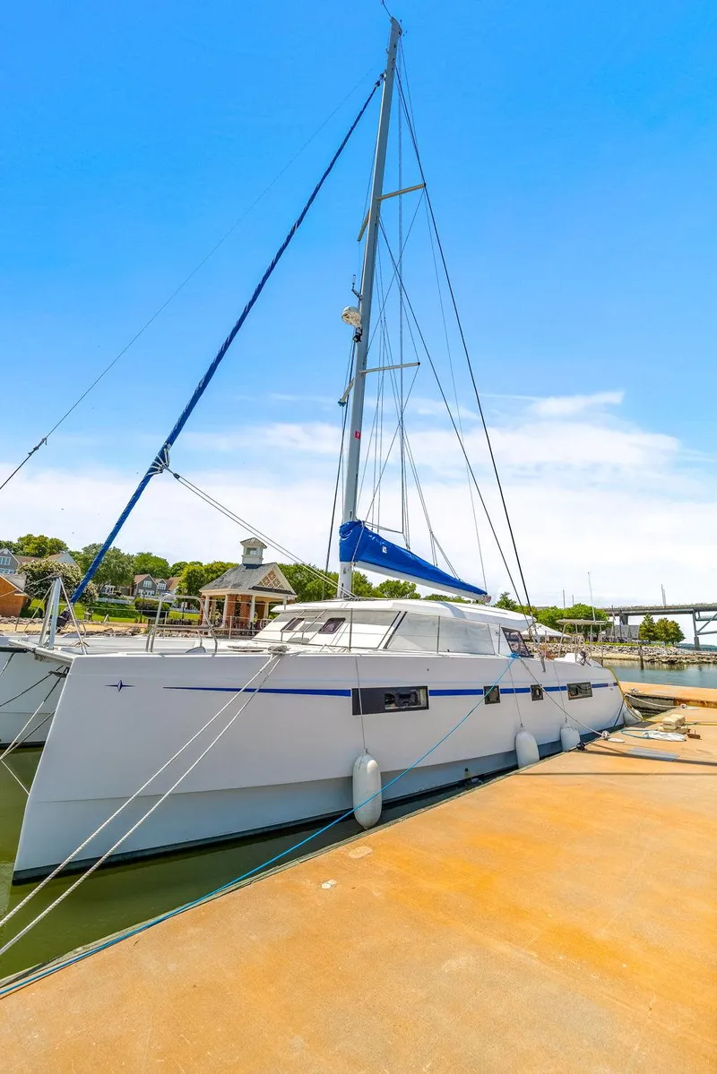 Slide: The Image of 2017 Nautitech 46 Open catamaran docked under clear blue sky. - 20
