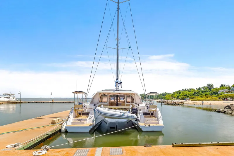 Slide: The Image of Nautitech 46 Open catamaran docked at marina, 2017 model, clear sky background. - 25
