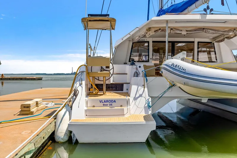 Slide: The Image of 2017 Nautitech 46 Open catamaran docked with inflatable boat attached. - 31