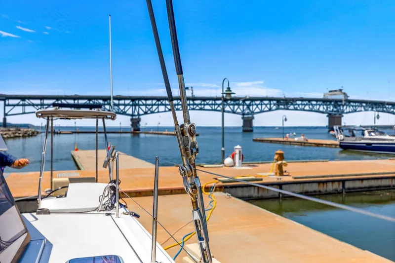 Slide: The Image of Nautitech 46 Open 2017 catamaran docked near a bridge on a sunny day. - 38