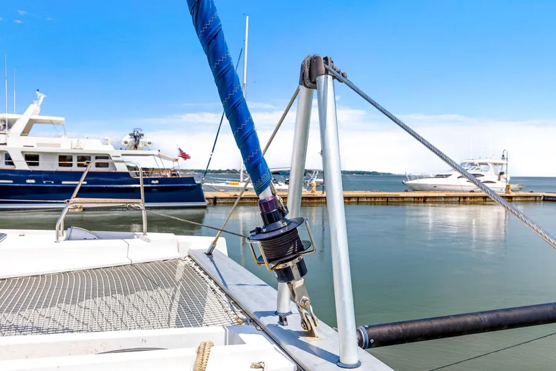 Slide: The Image of Nautitech 46 Open catamaran, 2017 model, docked in a marina with clear blue skies. - 45