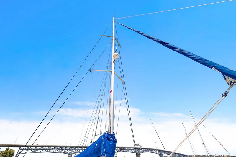 Slide: The Image of Sailboat mast of 2017 Nautitech 46 Open against clear blue sky. - 47
