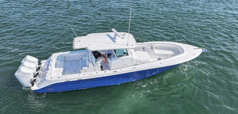 Slide: The Image of 2025 HCB 39 Speciale boat cruising on open water. - 2