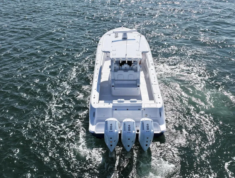 Slide: The Image of 2025 HCB 39 Speciale boat cruising on open water. - 3