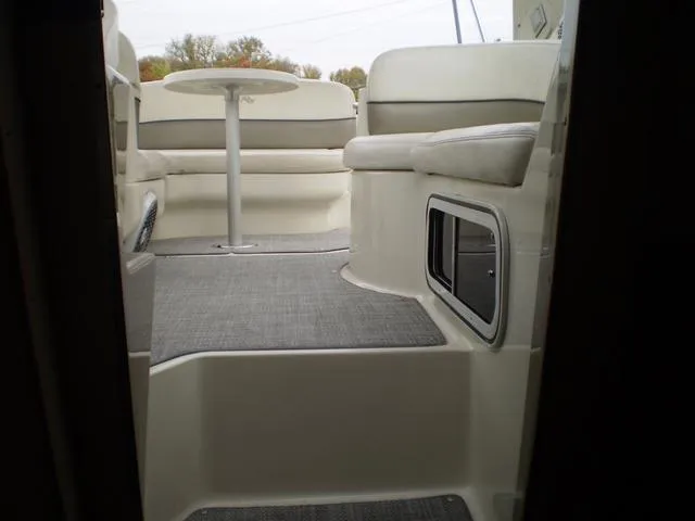 Slide: The Image of Interior view of 2005 Sea Ray 260 Sundancer boat with seating and table. - 15