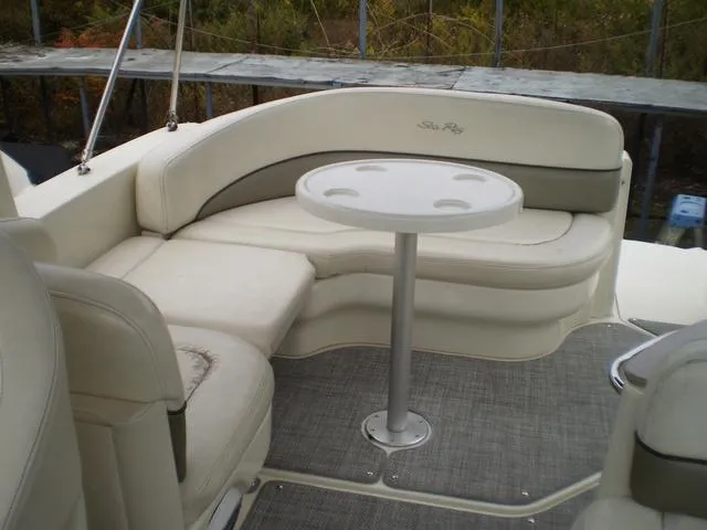 Slide: The Image of 2005 Sea Ray 260 Sundancer boat interior with seating and table. - 5
