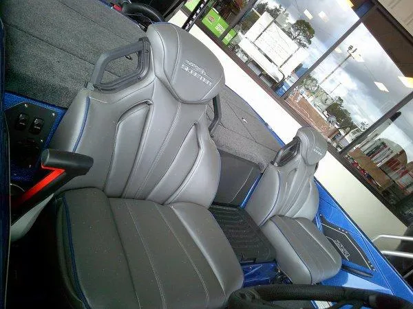 Slide: The Image of 2024 Skeeter ZXR20 boat interior with gray leather seats. - 6