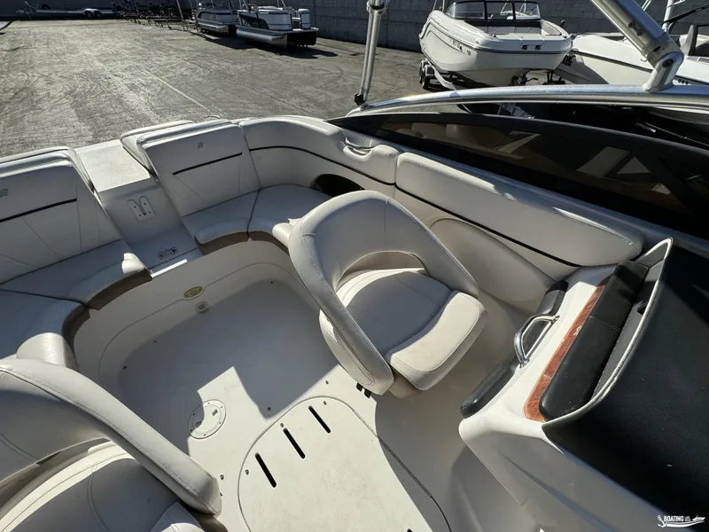 Slide: The Image of 2008 Four Winns Horizon 220SS boat interior with white seating and sleek design. - 14