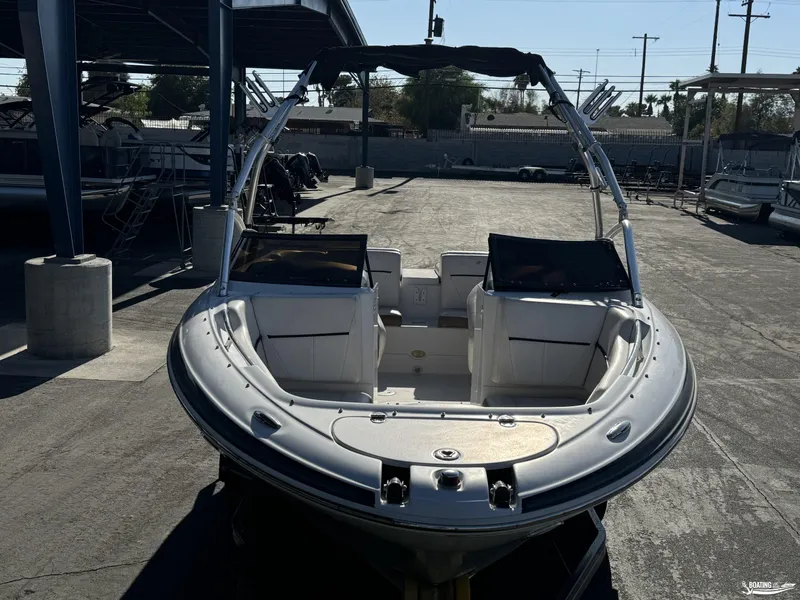 Slide: The Image of 2008 Four Winns Horizon 220SS boat in a storage facility, front view. - 3