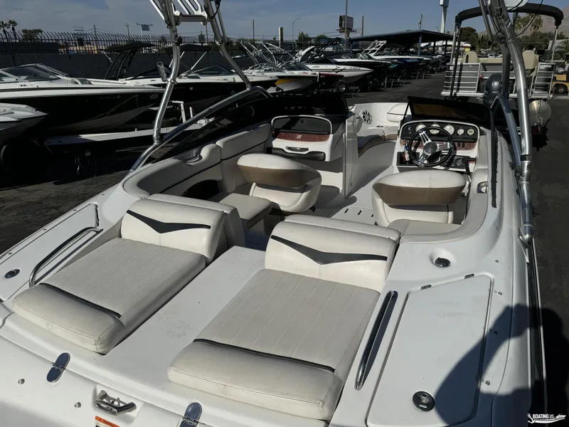 Slide: The Image of 2008 Four Winns Horizon 220SS boat with spacious seating and sleek design. - 7