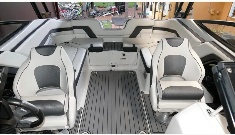 Slide: The Image of 2015 Yamaha Boats AR240 interior with sleek seating and modern design. - 11