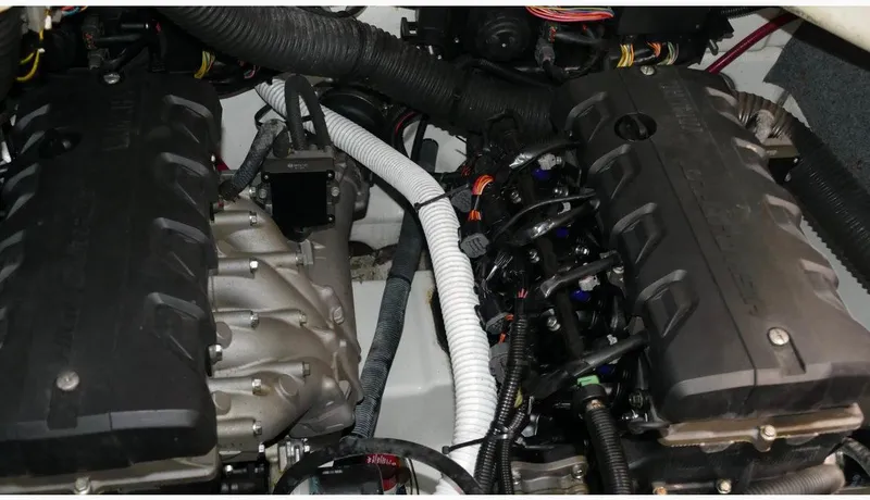 Slide: The Image of 2015 Yamaha AR240 engine compartment with dual engines and wiring. - 14