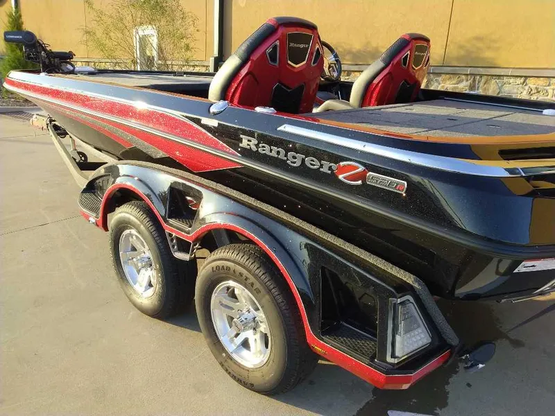 Slide: The Image of 2024 Ranger Z520R boat with dual seats and sleek design. - 2
