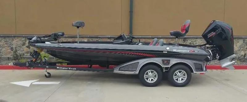 Slide: The Image of 2024 Ranger Z519 Ranger Cup Equipped boat on trailer, side view. - 0