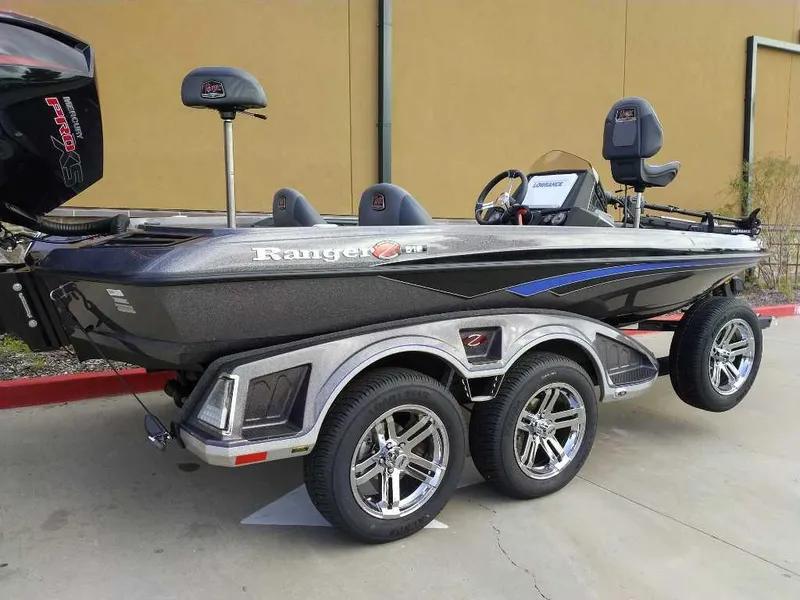 Slide: The Image of 2024 Ranger Z518 Ranger Cup Equipped boat on trailer, side view. - 3