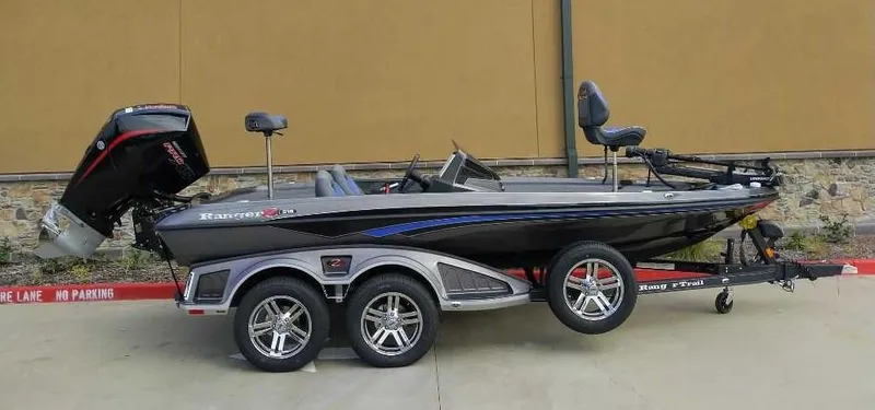 Slide: The Image of 2024 Ranger Z518 Ranger Cup Equipped boat on trailer, side view. - 4