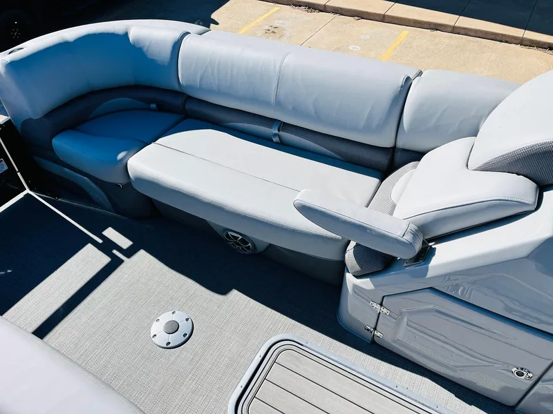 Slide: The Image of 2024 Regency 230 DL3 pontoon boat with luxurious gray seating. - 20
