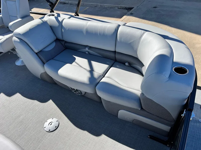 Slide: The Image of 2024 Regency 230 DL3 boat with luxurious gray seating. - 44