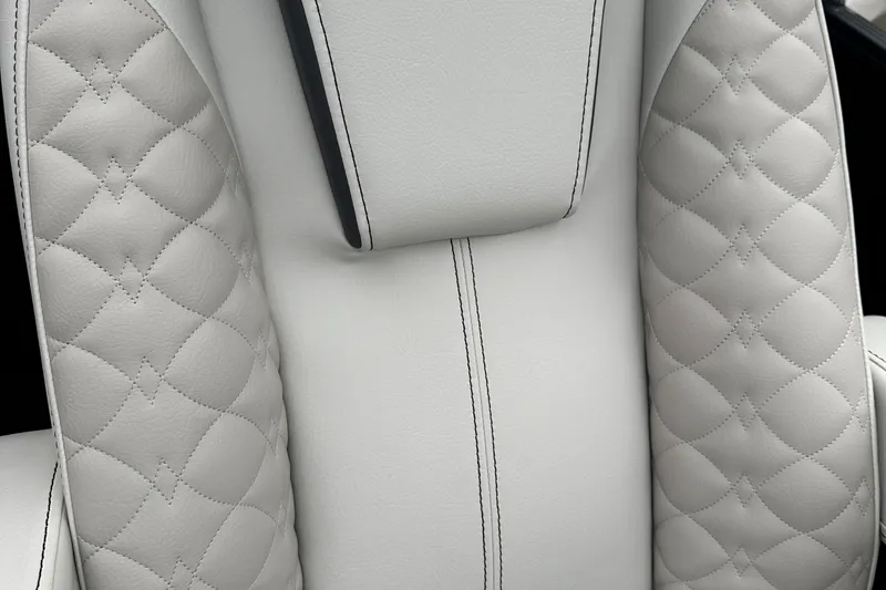 Slide: The Image of 2024 Manitou 25LX SRW luxury quilted white leather seat upholstery. - 5