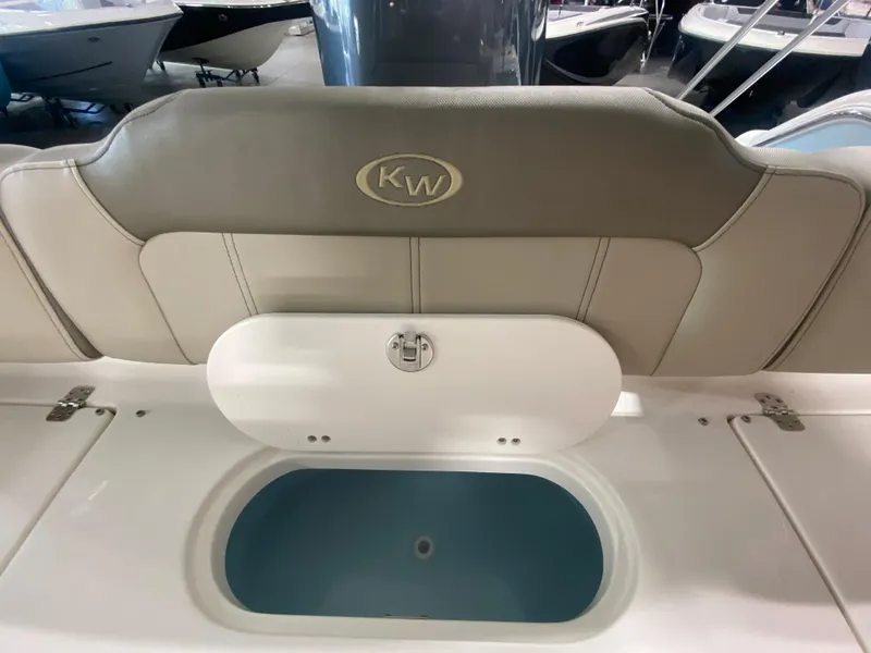 Slide: The Image of 2024 Key West 189 FS boat interior with livewell and cushioned seating. - 7