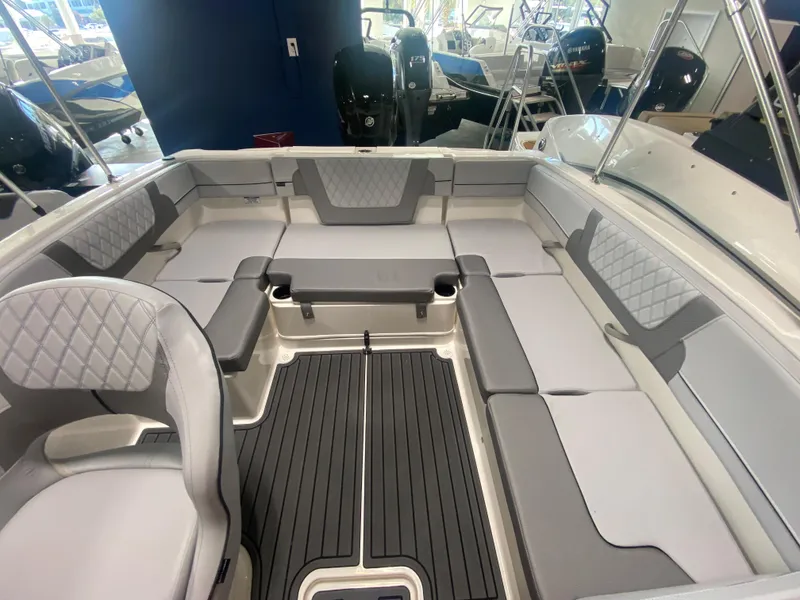Slide: The Image of 2024 Bayliner VR4 boat interior with spacious seating and modern design. - 5