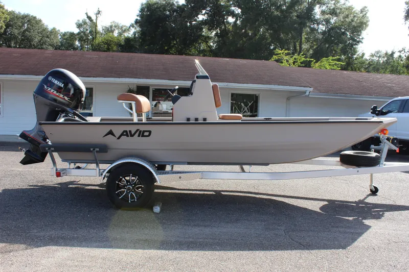Slide: The Image of 2024 Avid 18 Rogue fishing boat on trailer, side view. - 5
