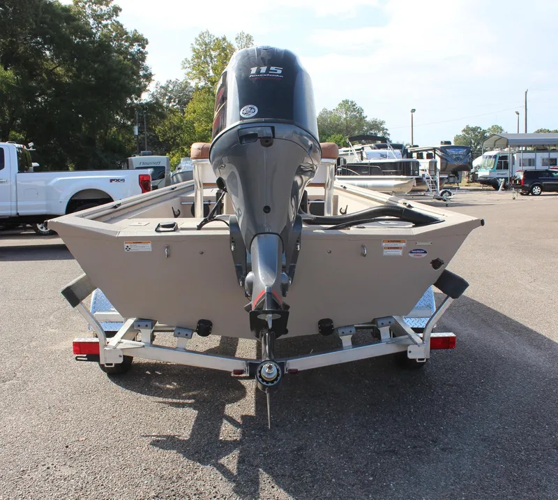 Slide: The Image of 2024 Avid 18 Rogue boat with 115 HP engine on trailer. - 7