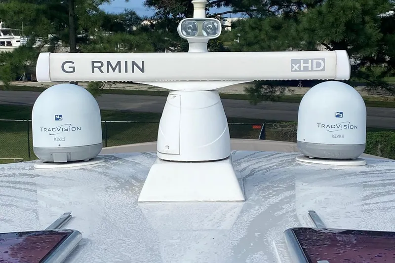 Slide: The Image of 2012 Sabre 48 Salon Express radar and satellite equipment on deck. - 20