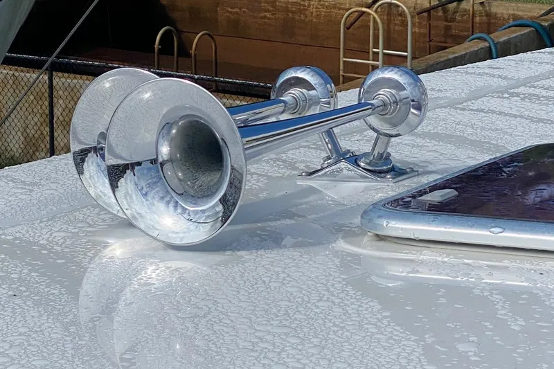 Slide: The Image of Chrome boat horn on 2012 Sabre 48 Salon Express yacht deck. - 21