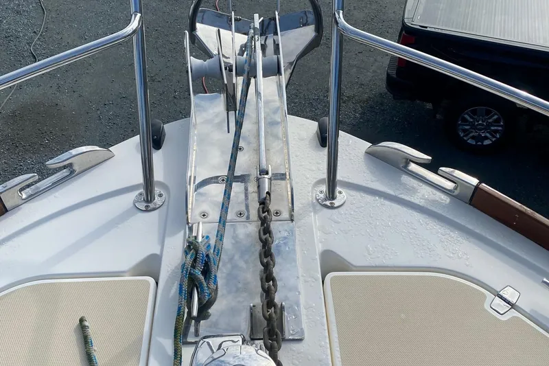 Slide: The Image of Bow of 2012 Sabre 48 Salon Express with anchor and ropes. - 22