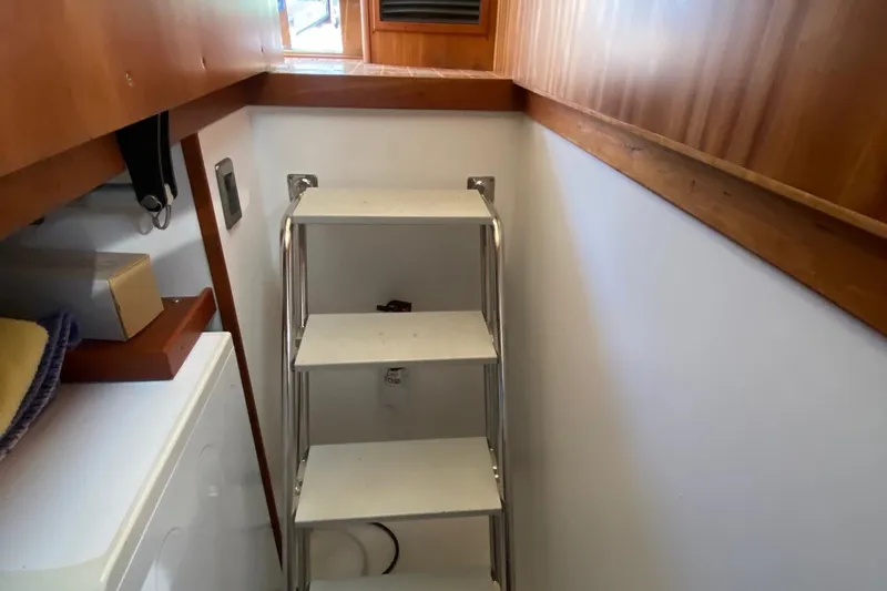 Slide: The Image of Narrow interior space with ladder on 2012 Sabre 48 Salon Express yacht. - 24