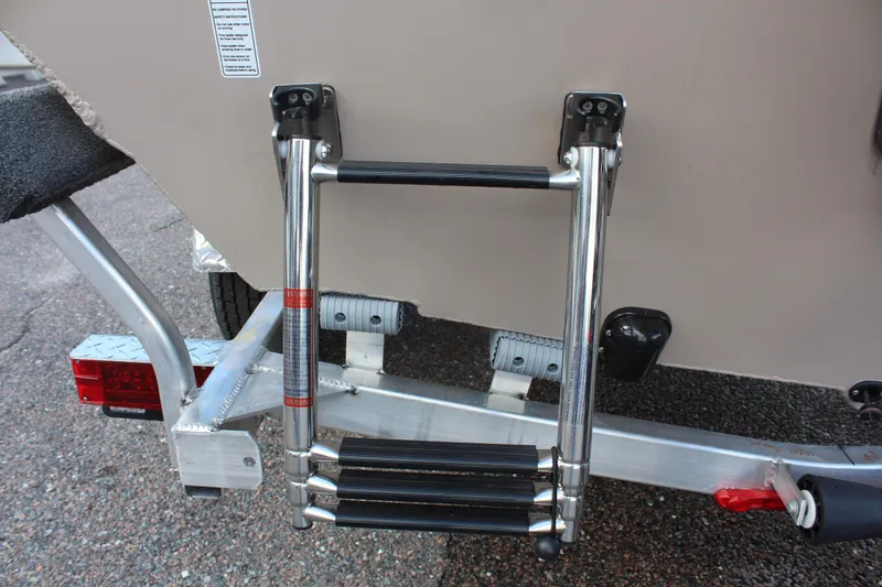 Slide: The Image of 2024 Avid 18 Rogue boat ladder and trailer detail - 6
